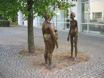 The sculpture of two women in bronze, Jag tänker på mig själv – Växjö ( 'I am thinking of myself - Växjö') by Marianne Lindberg De Geer, 2005, outside the art museum (Konsthallen) in Växjö, Sweden.[1][2] Its display of one thin woman and one fat woman is a demonstration against modern society's obsession with how we look. The sculpture has been a source of controversy in the town, with both statues being vandalized and repaired in 2006.[3]
