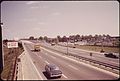 LOOKING NORTHEAST ACROSS ROUTE C1 ELEVATED HIGHWAY. HOMES OF EAST BOSTON'S NEPTUNE ROAD SECTION CAN BE SEEN BEHIND... - NARA - 549278.jpg