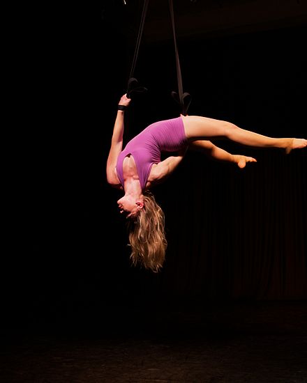 Aerialist performing on aerial straps. Leah Leor aerial straps.jpg