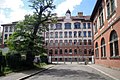 School, gym, porches, connecting corridors, toilet building in the courtyard and enclosure wall