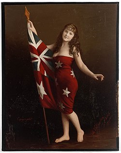 The Australian national flag and red ensign are common patriotic symbols of Australiana Marie-Celeste de Villentroy in Australian flag, ca. 1920.jpg
