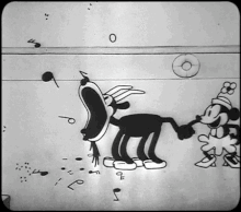 Minnie Mouse in Steamboat Willie, using a goat to play the song "Turkey in the Straw" Minnie Mouse in Steamboat Willie (1928).gif