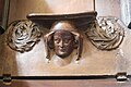 One of several misericords showing heads