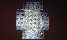 A picture of 150 mg tablets of the reversible MAOI drug moclobemide, brand name Aurorix. Moclobemide 150 mg tablets.jpg