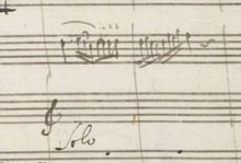 Measures 81-82 in the autograph manuscript, with no left-hand part. Mozart - Piano Concerto No. 26 - Piano mm 81 to 82 in the autograph manuscript.png