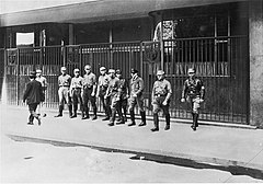 Nazi SA guard shut-down trade union headquarters in Berlin, 2 May 1933 Nazi SA guard shut-down trade union headquarters, Berlin.jpg