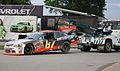 The NASCAR Nationwide car of w:Kyle Kelley being towed into the pits following the w:2013 Johnsonville Sausage 200 at w:Road America.   This file was uploaded with Commonist.