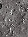 English: Sacrobosco lunar crater as seen from Earth with satellite craters labeled