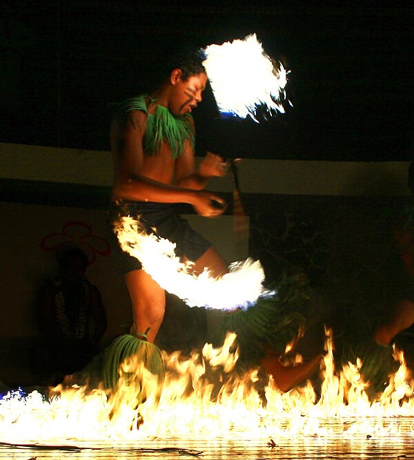 Boy performing a Samoan fire dance (siva afi)