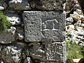 bas-relief de l’église Saint-Laurent du Poil, sculptés lors d’une tentative de reconstruction.