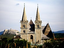 Two main symbols of the medieval Western civilization on one picture: the gothic St. Martin's cathedral in Spisske Podhradie (Slovakia) and the Spis Castle behind the cathedral Slovakia region Spis 33.jpg