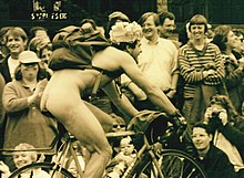 Naked cyclist streaking the 1995 Summer Solstice Parade. This would have been before this had become an established tradition; at this time the police were still hassling naked cyclists in the parade. Solstice Cyclist 1995.jpg