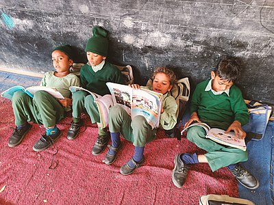 Students reading in leisure time at Government Primary school Asir, Sirsa, Haryana province of India
