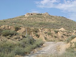 Kodra Caperutxa me mbetjet e kështjellës Saida