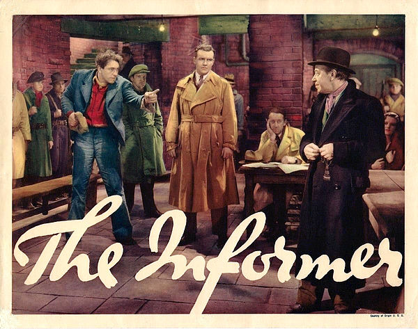 Lobby card for The Informer featuring Victor McLaglen, Preston Foster and Donald Meek