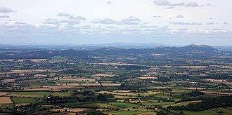The Malvern Hills above the Severn plain of the English West Midlands The Malvern Hills - geograph.org.uk - 1456678.jpg