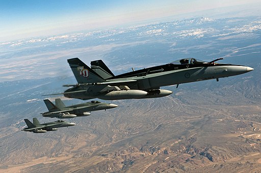 Three RAAF FA-18 Hornets in flight at Red Flag 2012