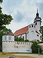 Kirche und Apothekergarten