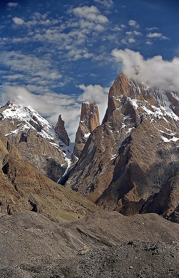 The Trango Towers in Pakistan. Their vertical faces are the world's tallest cliffs. Trango Tower center; Trango Monk center left; Trango II far left; 