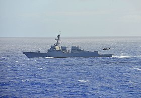 The Michael Murphy off Hawaii as a UH-60M Black Hawk helicopter approaches (2014)