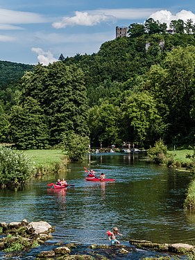 Swimmers and boaters in the river Wiesent