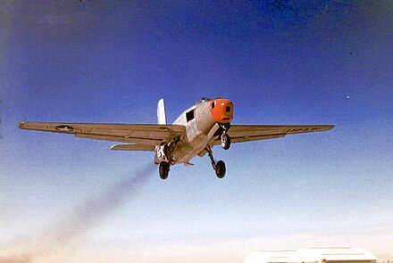 The second aircraft, YB-43 Versatile II, taking off. Undated. Note the solid, orange nose-cone that replaced the original clear nose