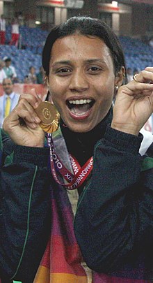 XIX Commonwealth Games-2010 Delhi (Women's 4x400m Relay) Mandeep Kaur of India won the Gold Medal, at Jawaharlal Nehru Stadium, in New Delhi on October 12, 2010 (cropped).jpg