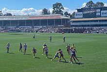 North Melbourne and Brisbane players contest the football during the 2023 AFL Women's Grand Final 2023 AFL Women's Grand Final.jpg