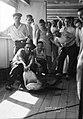 A group of off duty crew from Carinthia posing with a captured shark on deck (5074442285).jpg