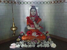 An idol of Akka Mahadevi holding Ishta Linga in her left hand Akkamahadevi Udathadi1.JPG