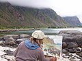 Artist (Maira) painting Hadseløya beach - panoramio.jpg