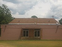 The former Ashland High School gymnasium was converted into the Ashland Community Center, but the structure was destroyed by fire in the summer of 2009. Ashland Community Center (Former Ashland HS Gym), Ashland, LA IMG 1628.jpg