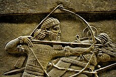 Ashurbanipal, detail of a lion-hunt scene from Nineveh, 7th century BC, the British Museum.jpg