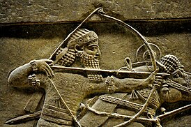 Ashurbanipal, detail of a lion-hunt scene from Nineveh, 7th century BC, the British Museum.jpg