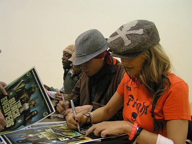 The Black Eyed Peas signing autographs in 2004