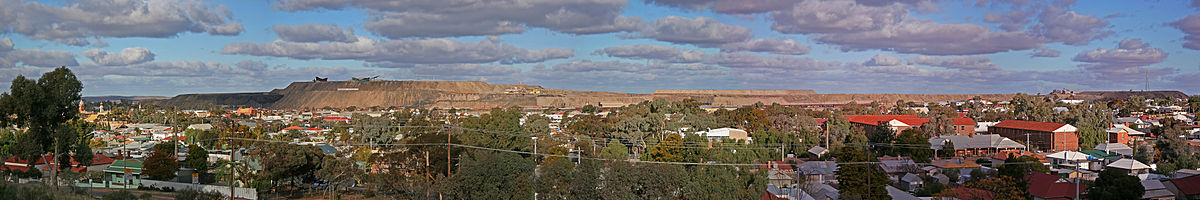 A panorama of Broken Hill, New South Wales, backed by waste dumps and tailings from the line of lode