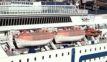 Partially enclosed lifeboats on a passenger liner Brosen lifeboats scandinavia.jpg