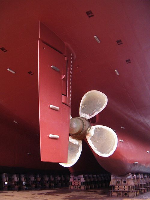 Modern ship rudder (the long red rectangle behind the propeller)