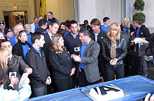 Various staff of CKVR at a 2010 open house. Front row from left: Mike Arsalides (holding paper), Tony Grace, former station manager Peggy Hebden, Rob Cooper, Jayne Pritchard. CKVR cake cutting.jpg