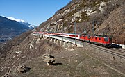 47.–48. KW Saisonaler Zug der City Night Line auf der Lötschberg-Südrampe kurz vor Brig-Glis im Schweizer Kanton Wallis (Februar 2010).