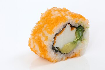 Sushi roll covered in tobiko