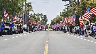 San Diego residents lining the street.