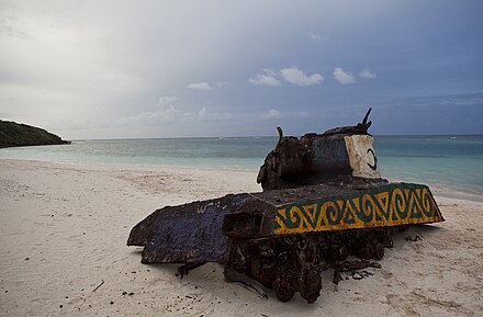 One of several World War II-era American Sherman tanks stranded in the sand of Flamenco Beach.