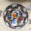 Decorative Painted Plate with a Peacock, on a Monastery's Wall