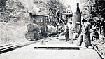 DuPont Highway road construction at Ellendale, Delaware, 1918 using a narrow gauge 20hp 0-4-0 well tank loco built by Orenstein & Koppel in Berlin, Germany (Delaware Public Archives).jpg