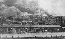 Burning ghetto viewed from Zoliborz district Dworzec Gdanski i plonace getto 1943.jpg