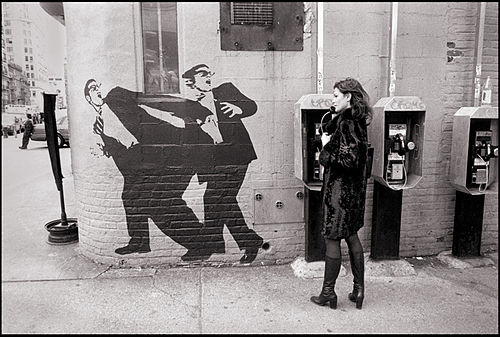 A wall in the East Village in 1998, featuring a mural of two men