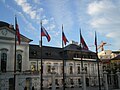 Slovakian flags in front of the Slovakian presidential palace in Bratislava