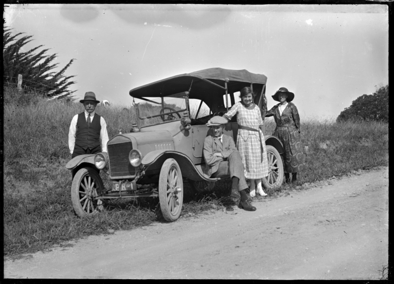 File:Four people with a car, motoring near Whangarei, 1923 ATLIB 300156.png