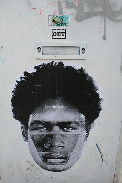 File:Graffiti in Shoreditch, London - Incriminated (13818249193).jpg